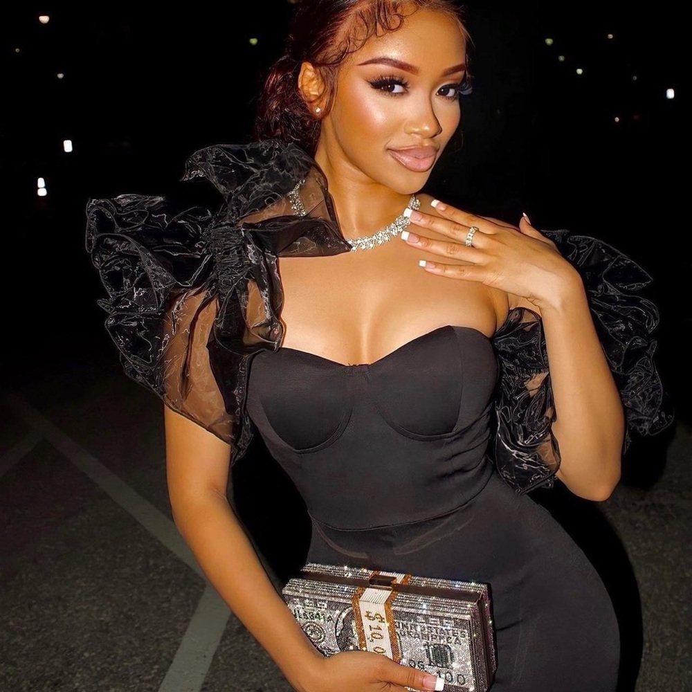 Fashion Nova black tulle bodycon jumpsuit with side hem spilts. Worn once